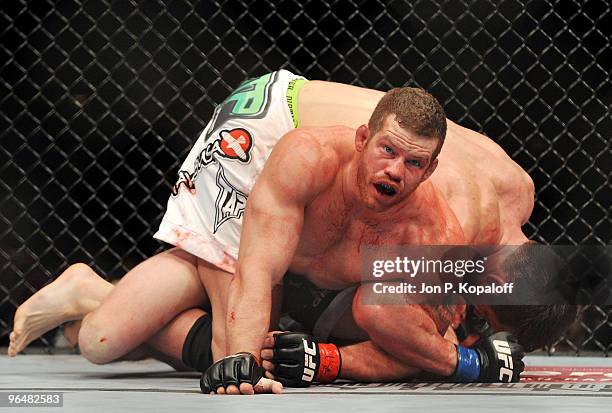 Fighter Chael Sonnen battles UFC fighter Nate Marquardt during their Middleweight fight at UFC 109: Relentless at Mandalay Bay Events Center on...