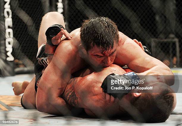 Fighter Chael Sonnen battles UFC fighter Nate Marquardt during their Middleweight fight at UFC 109: Relentless at Mandalay Bay Events Center on...