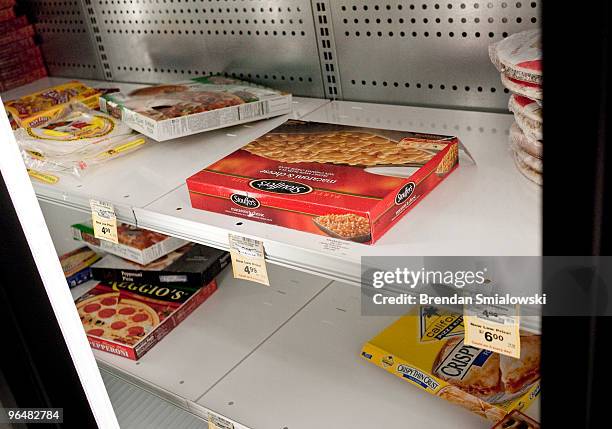 The frozen food shelves at a Safeway are left sparse after a snowstorm February 7, 2010 in Washington, DC. The DC area has begun to clean up after...