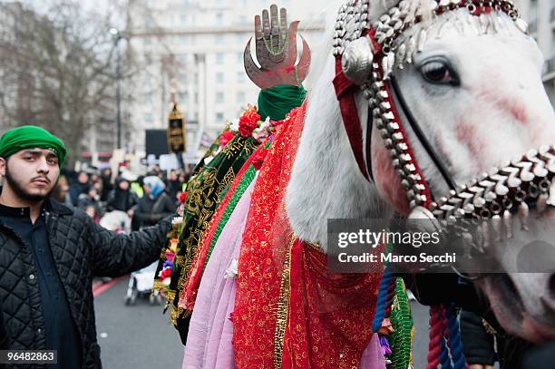 White horse representing Imam Husain horse Zuljina participates in the 29th Arbaeen Procession on February 7, 2010 in London, England. Arbaeen occurs...