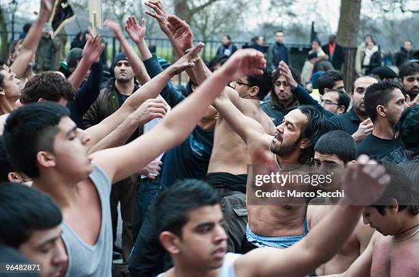 Shiite Muslim devotees beat their chests during the 29th Arbaeen Procession on February 7, 2010 in London, England. Arbaeen occurs 40 days after the...