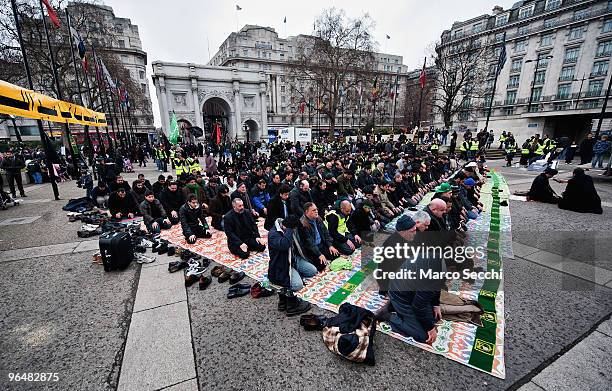 Shiite Muslim devotees pray at Marble Arch ahead of the 29th Arbaeen Procession on February 7, 2010 in London, England. Arbaeen occurs 40 days after...