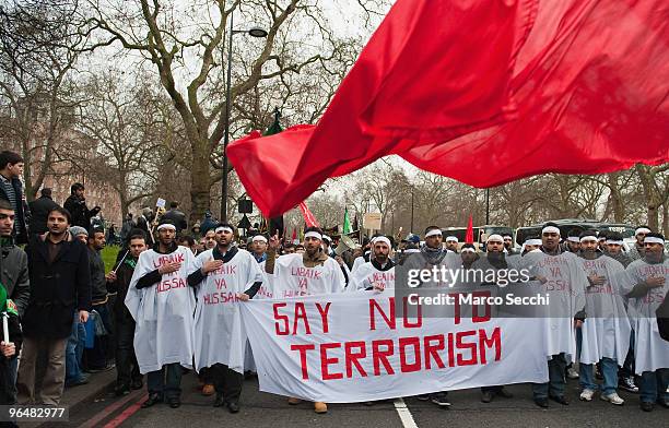 Shiite Muslim devotees march during the 29th Arbaeen Procession on February 7, 2010 in London, England. Arbaeen occurs 40 days after the day of...