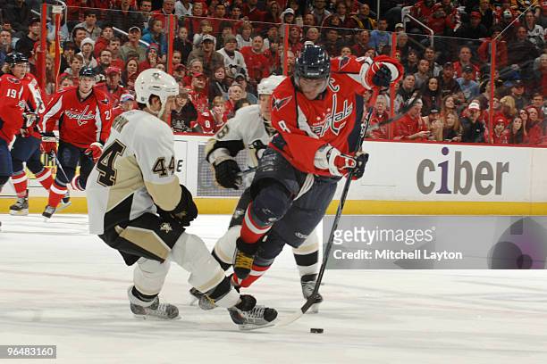 Alex Ovechkin of the Washington Capitals skates down ice with the puck during a NHL hockey game against the Pittsburgh Penguins on February 7, 2010...