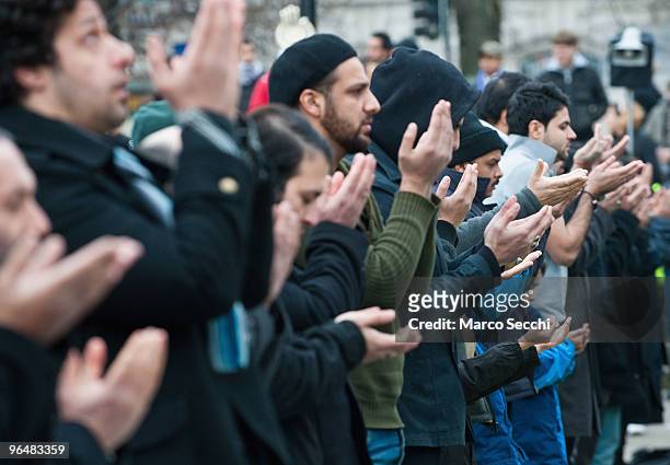 Shiite Muslim devotees pray at Marble Arch ahead of the 29th Arbaeen Procession on February 7, 2010 in London, England. Arbaeen occurs 40 days after...