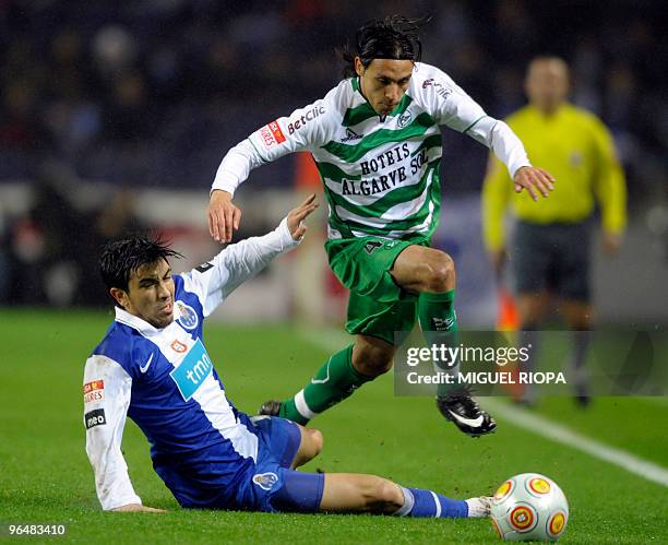 Porto's defender Jorge Fucile of Uruguay vies with Naval´s defender Mario Paulino "Camora" during their Portuguese first league football match at the...