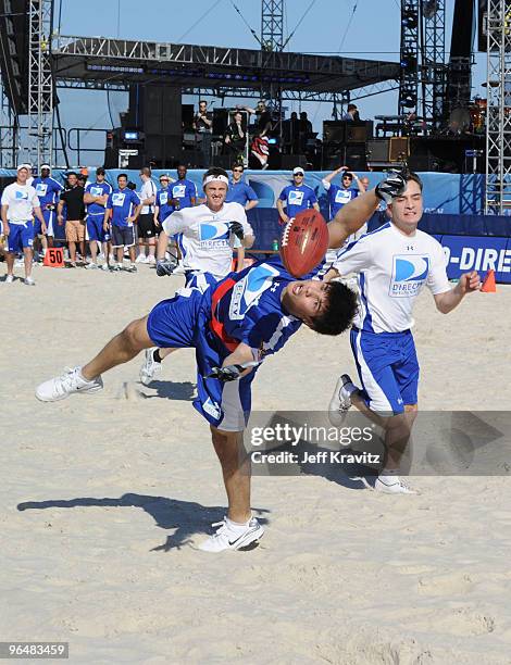 Taylor Lautner and Ed Westwick attend DIRECTV's 4th Annual Celebrity Beach Bowl on February 6, 2010 in Miami Beach, Florida.