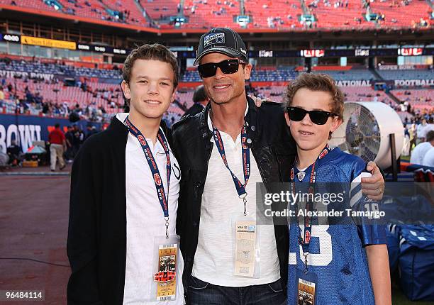 Actor Rob Lowe and sons Matthew Edward Lowe and John Owen Lowe attend Super Bowl XLIV at the Sun Life Stadium on February 7, 2010 in Miami Gardens,...