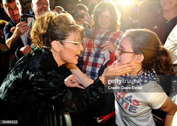 Former Alaska Gov. Sarah Palin greets the crowd during a campaign rally for Texas Gov. Rick Perry February 7, 2010 in Cypress, Texas. Perry is...