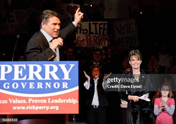 Texas Gov. Rick Perry introduces former Alaska Gov. Sarah Palin during a campaign rally for Perry February 7, 2010 in Cypress, Texas. Perry is...