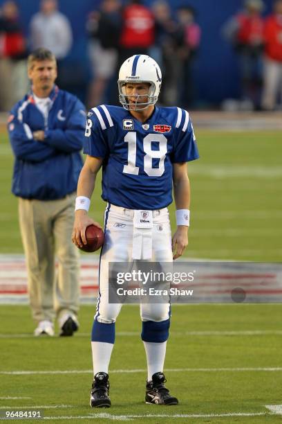 Peyton Manning of the Indianapolis Colts warms up before playing against the New Orleans Saints in Super Bowl XLIV on February 7, 2010 at Sun Life...