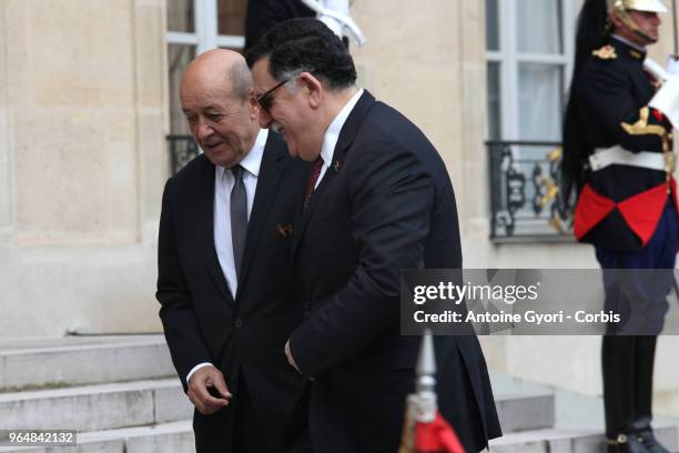 French Foreign Affairs Minister Jean-Yves Le Drian welcomes Chairman of the Presidential Council of Libya, Fayez al-Sarraj upon his arrival for the...