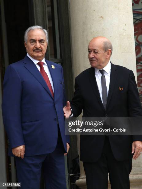 French Foreign Affairs Minister Jean-Yves Le Drian welcomes Libya Chief of Staff, Marshall Khalifa Haftar , upon his arrival for the international...