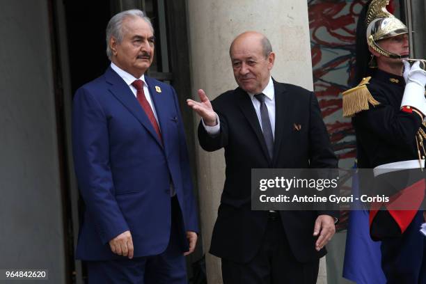 French Foreign Affairs Minister Jean-Yves Le Drian welcomes Libya Chief of Staff, Marshall Khalifa Haftar , upon his arrival for the international...