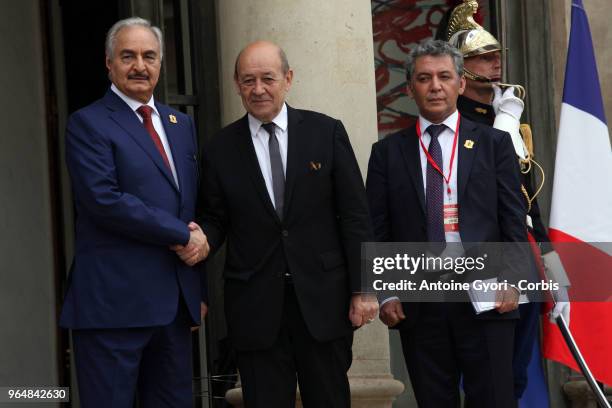 French Foreign Affairs Minister Jean-Yves Le Drian welcomes Libya Chief of Staff, Marshall Khalifa Haftar , upon his arrival for the international...