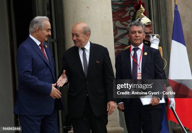 French Foreign Affairs Minister Jean-Yves Le Drian welcomes Libya Chief of Staff, Marshall Khalifa Haftar , upon his arrival for the international...