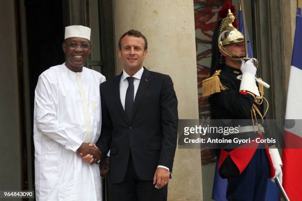 French President Emmanuel Macron welcomes Chad President Idriss Deby , upon his arrival for the international congress on Libya, at the Elysee Palace...