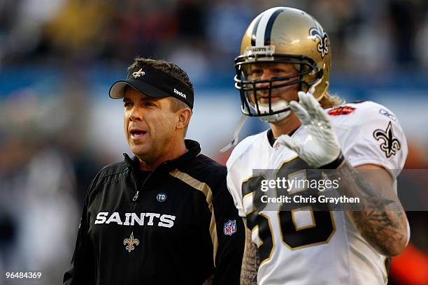 Head Coach Sean Payton and Tight end Jeremy Shockey of the New Orleans Saints wait on the field prior to Super Bowl XLIV against the Indianapolis...