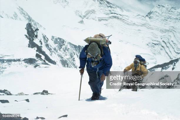 Edmund Hillary and Tenzing Norgay approach the South East ridge at 27,300 feet, Edmund Hillary and Tenzing Norgay approaching the South East ridge at...