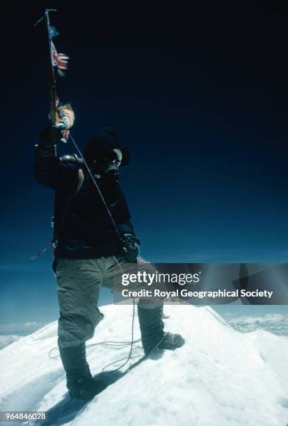 Tenzing Norgay on the Summit of Mount Everest, Tenzing Norgay on the summit of Mount Everest at 11:30am on 29th May 1953. Tenzing waves his ice-axe...