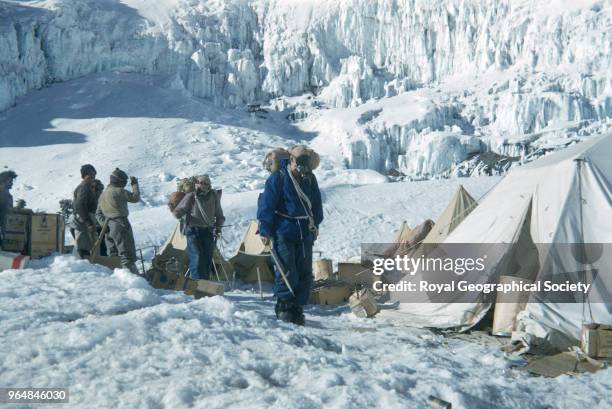 Bourdillon and Evans leave Camp IV for the first attempt at the summit, Tom Bourdillon and Charles Evans leave Camp IV with their cumbersome oxygen...