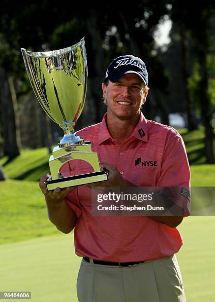 Steve Stricker poses with the trophy after the final round of the Northern Trust Open at Riviera Country Club on February 7, 2010 in Pacific...