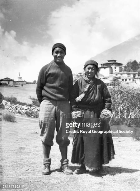 Tenzing Norgay with his mother at Thyangboche Monastery, Tenzing Norgay with his mother Kinzom at Thyangboche Monastery. Kinzom gave her blessing to...