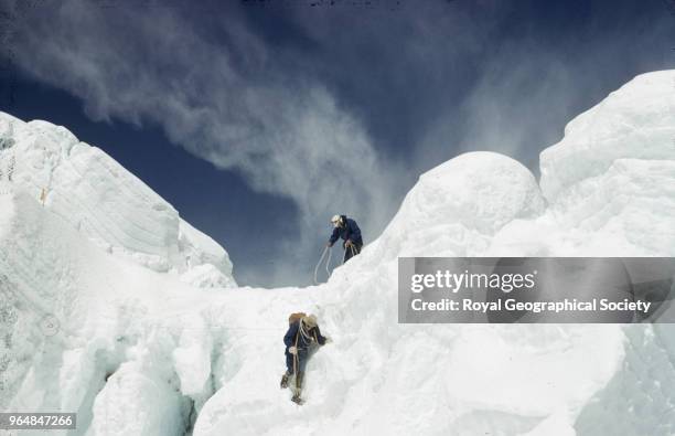 Team members reconnoitring in the icefall, Nepal, March 1953. Mount Everest Expedition 1953.