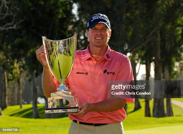 Steve Stricker poses with the tournament trophy after winning the Northern Trust Open at Riviera Country Club on February 7, 2010 in Pacific...