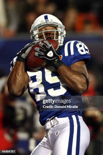 Pierre Garcon of the Indianapolis Colts catches a touchdown pass in the first quarter against the New Orleans Saints during Super Bowl XLIV on...