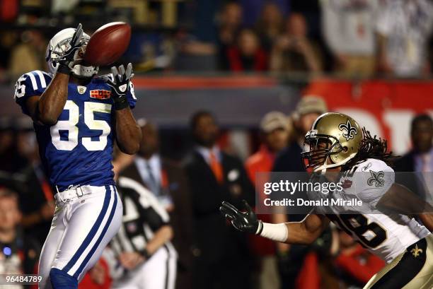 Pierre Garcon of the Indianapolis Colts catches a touchdown pass in the first quarter against the New Orleans Saints during Super Bowl XLIV on...