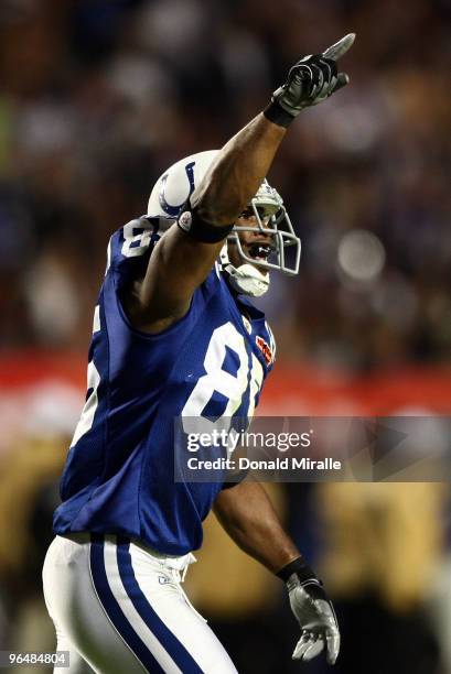 Pierre Garcon of the Indianapolis Colts celebrates after catching a touchdown pass in the first quarter against the New Orleans Saints during Super...
