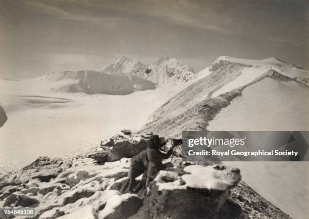 View along ridge to 21,300 snow peak, Summits of Chomo Lonzo and Makalu in centre, China , May 1921. Mount Everest Expedition 1921.