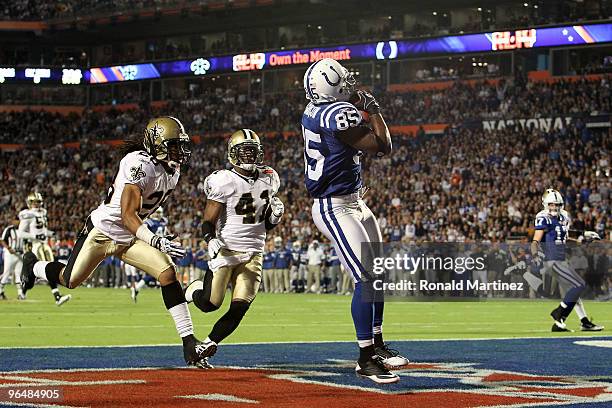 Pierre Garcon of the Indianapolis Colts makes a catch for a touchdown against the New Orleans Saints during the first quarter Super Bowl XLIV on...