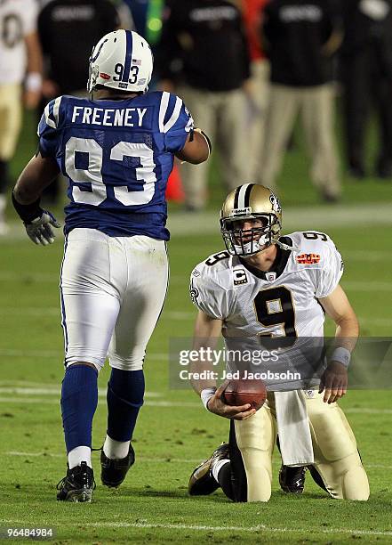 Dwight Freeney of the Indianapolis Colts walks away after sacking Drew Brees of the New Orleans Saints during Super Bowl XLIV on February 7, 2010 at...