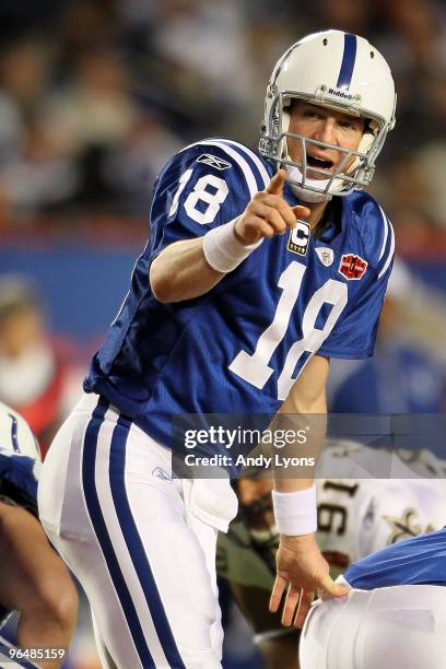 Peyton Manning of the Indianapolis Colts signals under center against the New Orleans Saints during Super Bowl XLIV on February 7, 2010 at Sun Life...