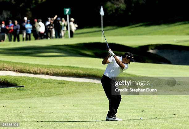Andres Romero of Argentina hits his second shot on the seventh hole during the final round of the Northern Trust Open at Riviera Country Club on...