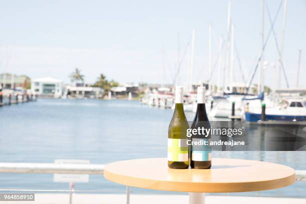 wine served with a marina view - mooloolaba stock-fotos und bilder