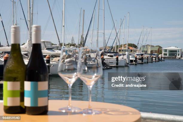 wine served with a marina view - mooloolaba stock-fotos und bilder