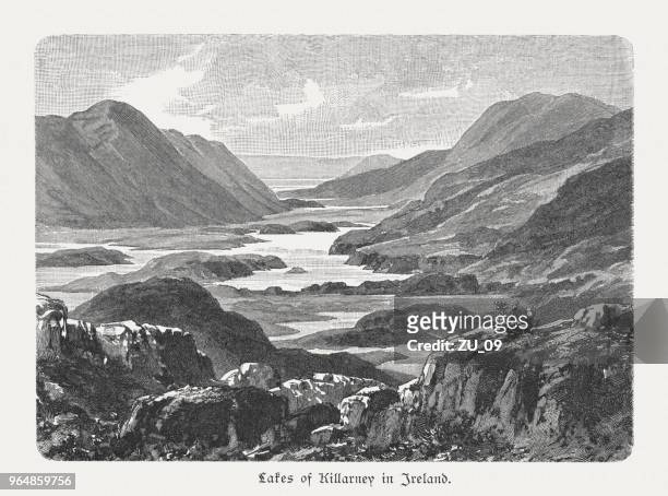lakes of killarney in ireland, wood engraving, published in 1897 - lakes of killarney stock illustrations