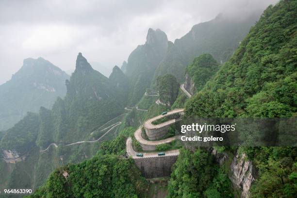 mountain road to tianmen mountain - tianmen stock pictures, royalty-free photos & images