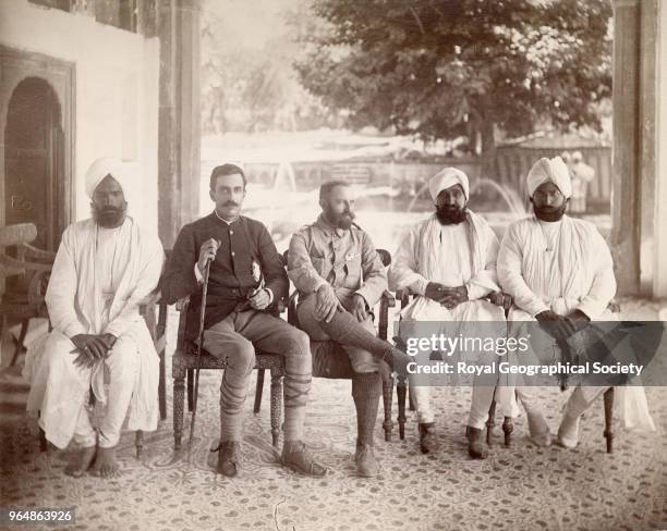 Group of Kashmiri officials in the Vale of Kashmir, Image taken during the 'Gilgit Mission' of 1885-86 with Colonel W.S.A Lockhart and Colonel R.G....