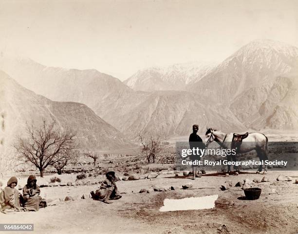 Mouth of the Hunza River from Juteal / Peasant women cleaning cotton - Kashmir, Image taken during the 'Gilgit Mission' of 1885-86 with Colonel W.S.A...