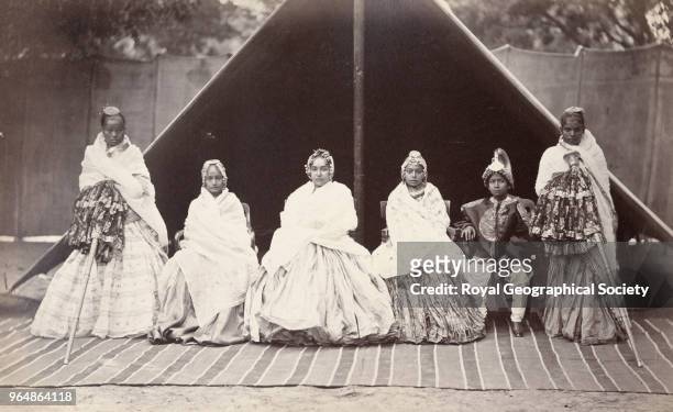Jung Bahadur's three favourite wives- his son and a female slave on each side - these wives were burnt alive at his cremation, India, 1885.