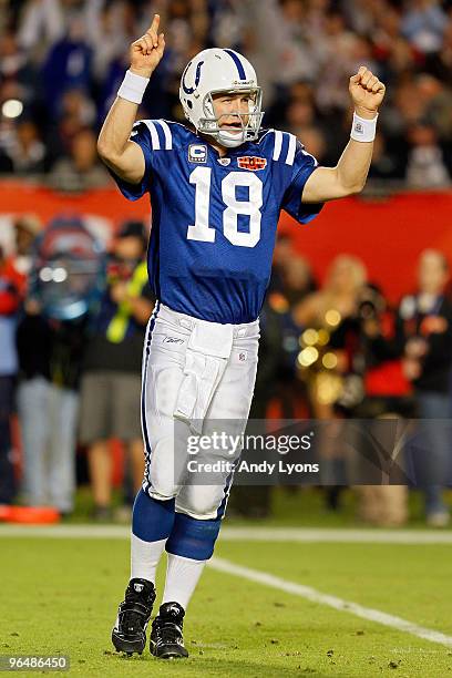 Peyton Manning of the Indianapolis Colts celebrates after a touchdown in the third quarter against the New Orleans Saints during Super Bowl XLIV on...