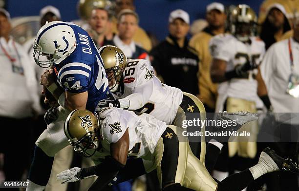 Dallas Clark of the Indianapolis Colts runs with the ball against the New Orleans Saints during Super Bowl XLIV on February 7, 2010 at Sun Life...