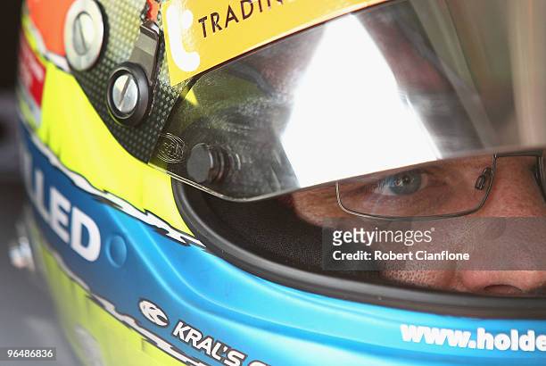Jason Bright driver of the Trading Post Racing Holden sits in his car during the V8 Supercars official test day at Winton Raceway on February 8, 2010...