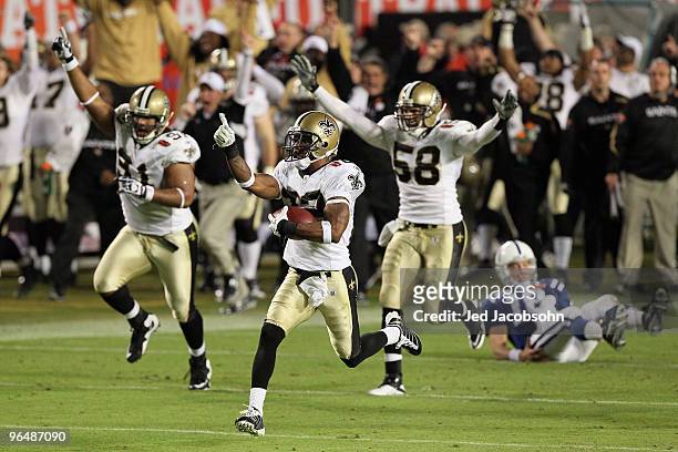 Tracy Porter of the New Orleans Saints intercepts a ball and thrown by Peyton Manning of the Indianapolis Colts and returns it for a touchdown in the...