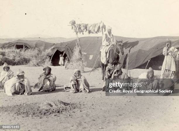 Camel hair cloth tents and goat on a pole in Baluchistan, Pakistan, 1896.