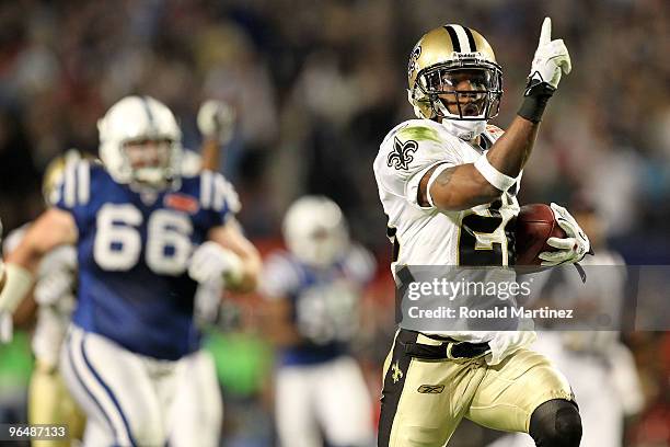 Tracy Porter of the New Orleans Saints returns a interception for touchdown against of the Indianapolis Colts during Super Bowl XLIV on February 7,...